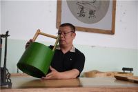 世园会上绿色水桶四川嘉熙造 无外箍靠上百竹片聚合