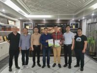 亿固瓷砖胶与三荣企业集团签署战略合作协议